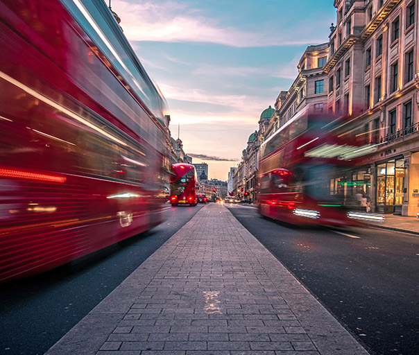 Business legal consulting london / abstract image of busses on a London Street